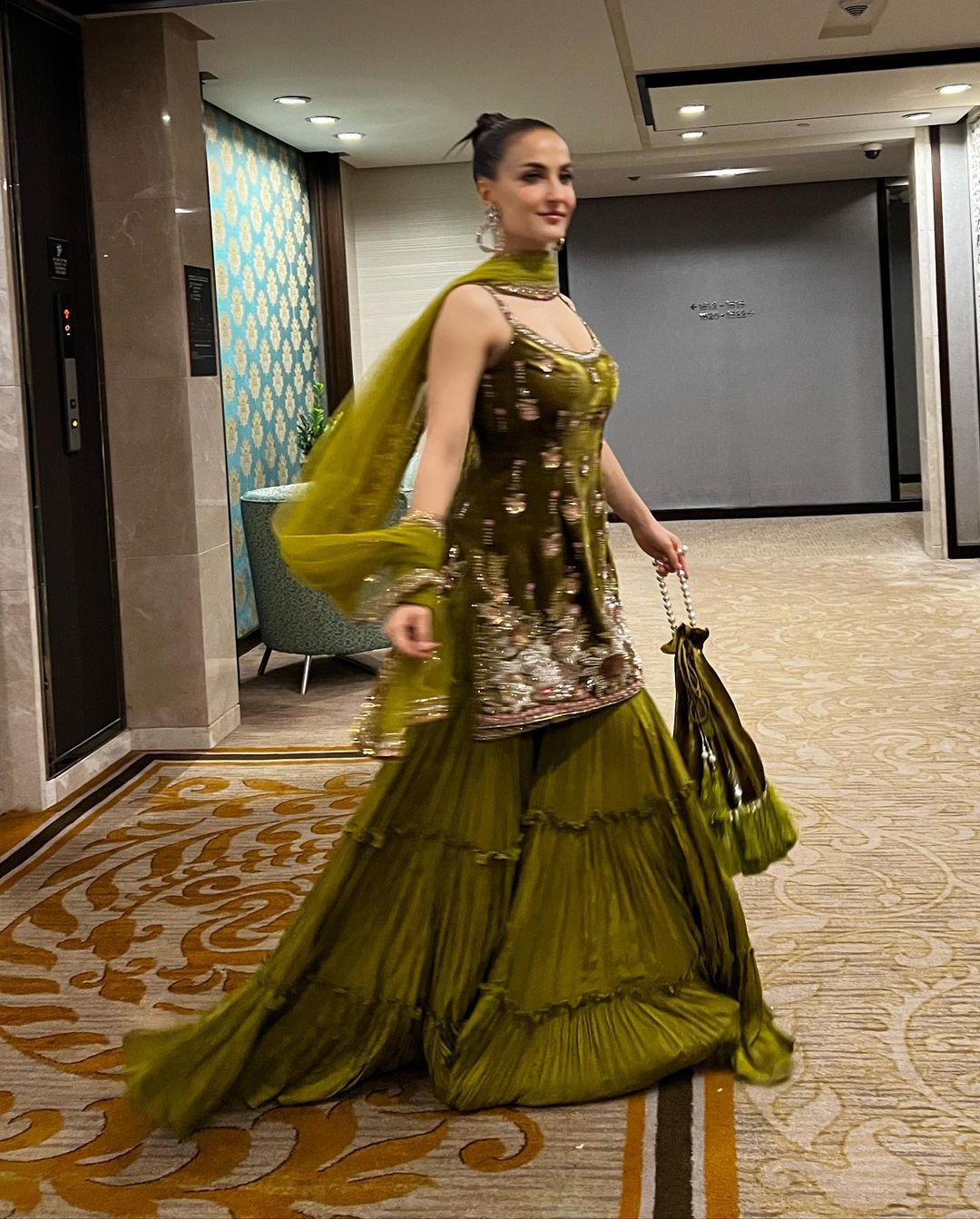 BOLLYWOOD ACTRESS ELLI AVRRAM STILLS IN GREEN GOWN 7